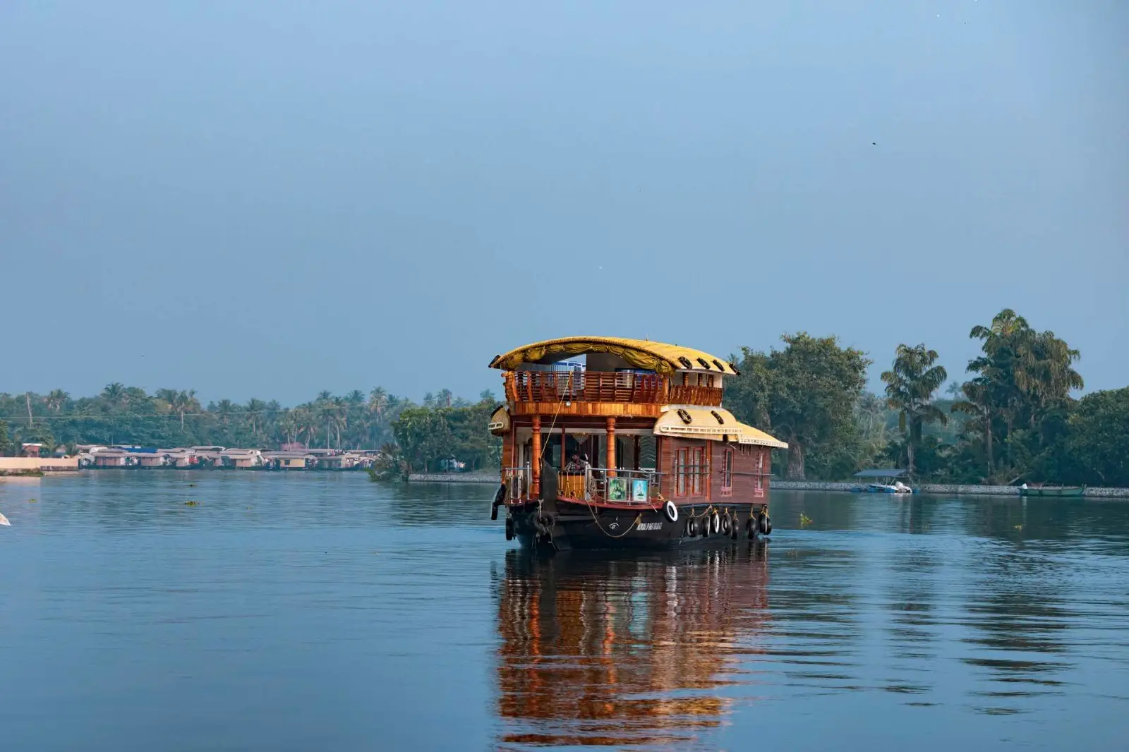 Premium two-bedroom Kerala houseboat on the open water of Vembanad lake