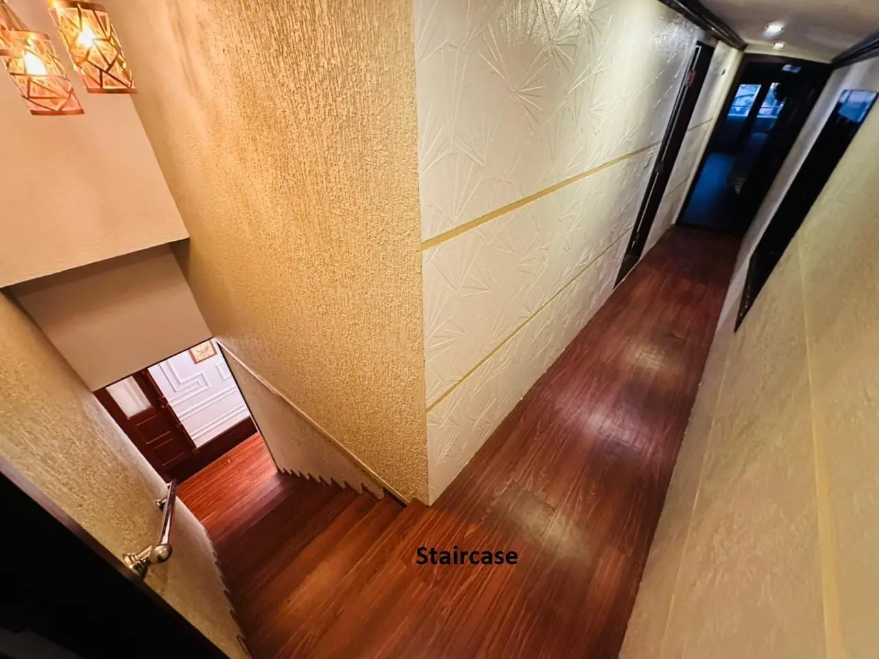 Internal staircase connecting the two decks of a large Kerala houseboat
