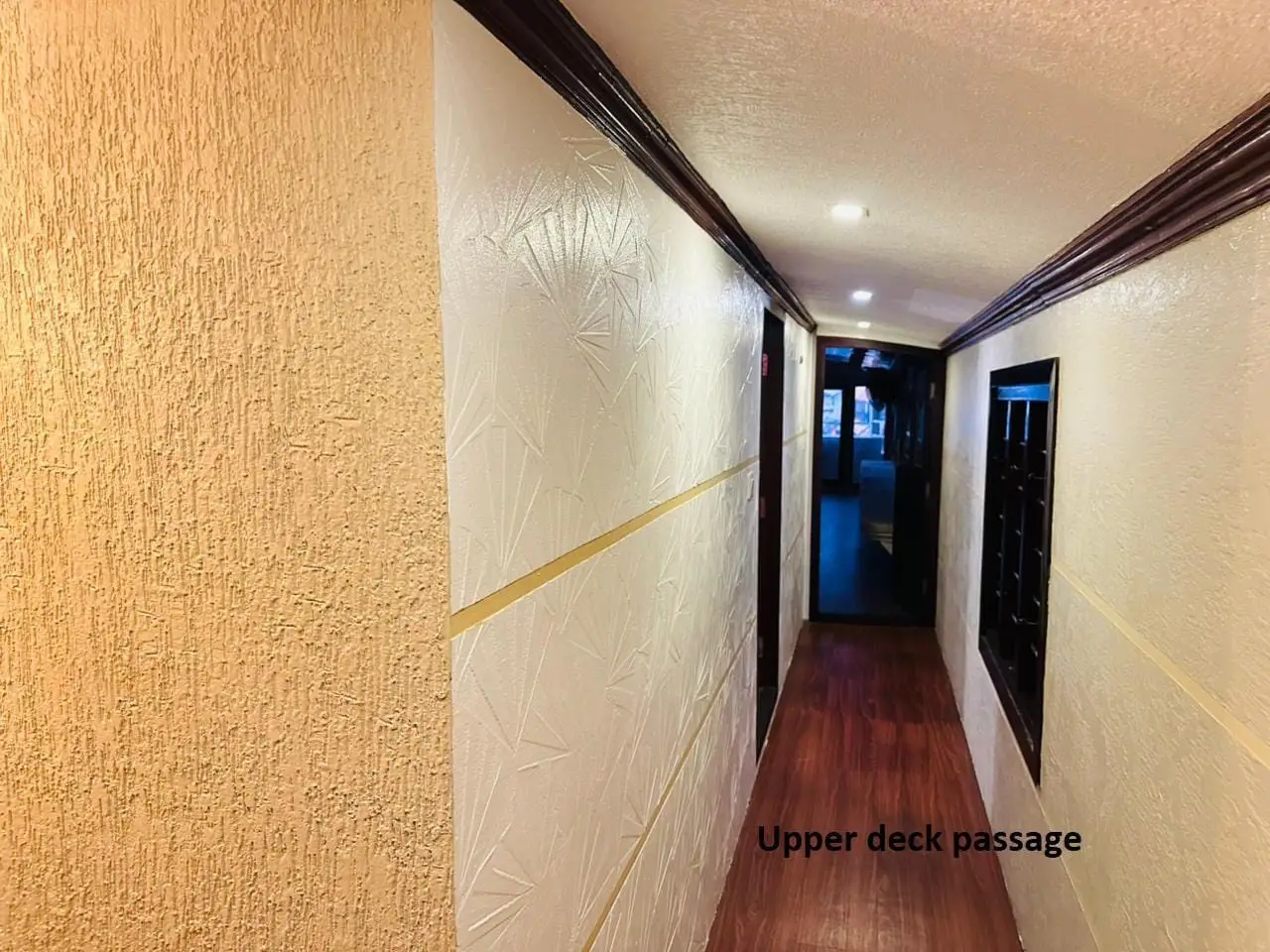 Upper deck passage leading to the bedrooms on a double-decker houseboat